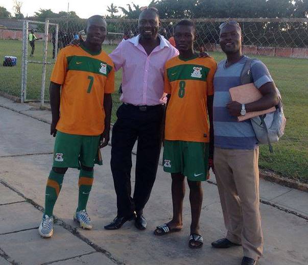 Patrick Ngoma (7) with his club [Edusport] owner Dr Oscar Mwaanga. Dr Mwaanga is an associate professor at University in Southampton with a major in psychology. Edusport have produced Fwayo Tembo, Justine Zulu and Rodger Kola
